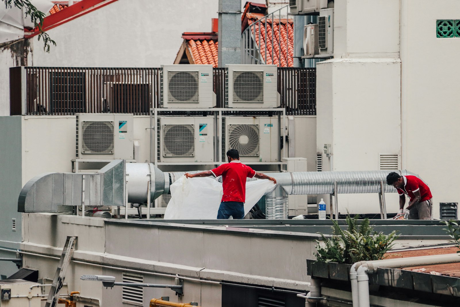 Commercial rooftop HVAC units serviced by REP Holdings